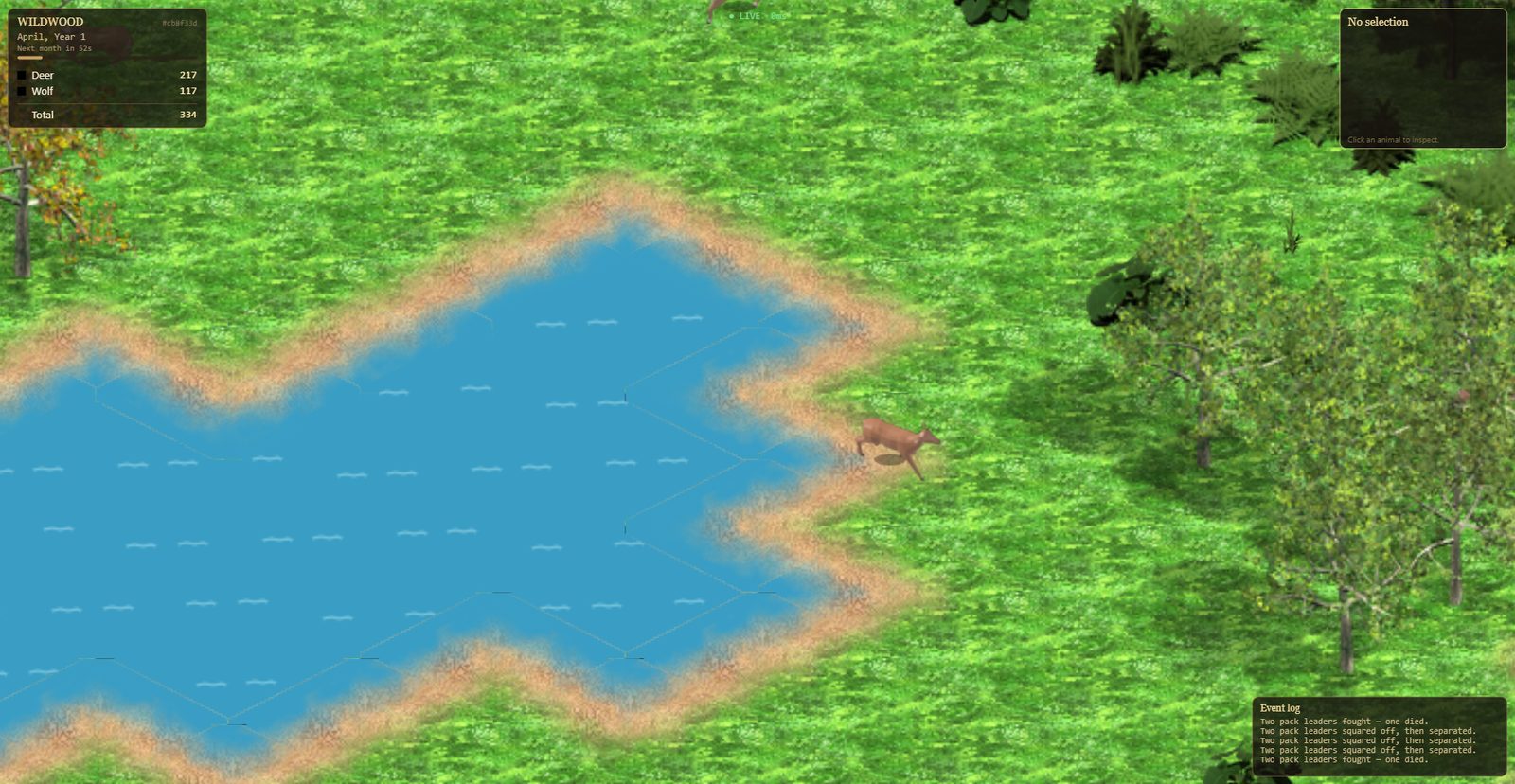 A deer standing at the sandy edge of a large pond, head lowered to the water.
